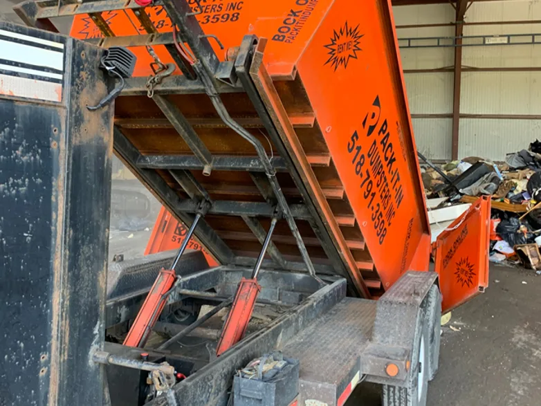 Construction Dumpster Rentals pack in it