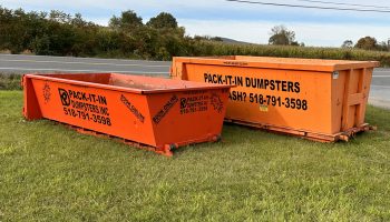 dump trailer in the grass